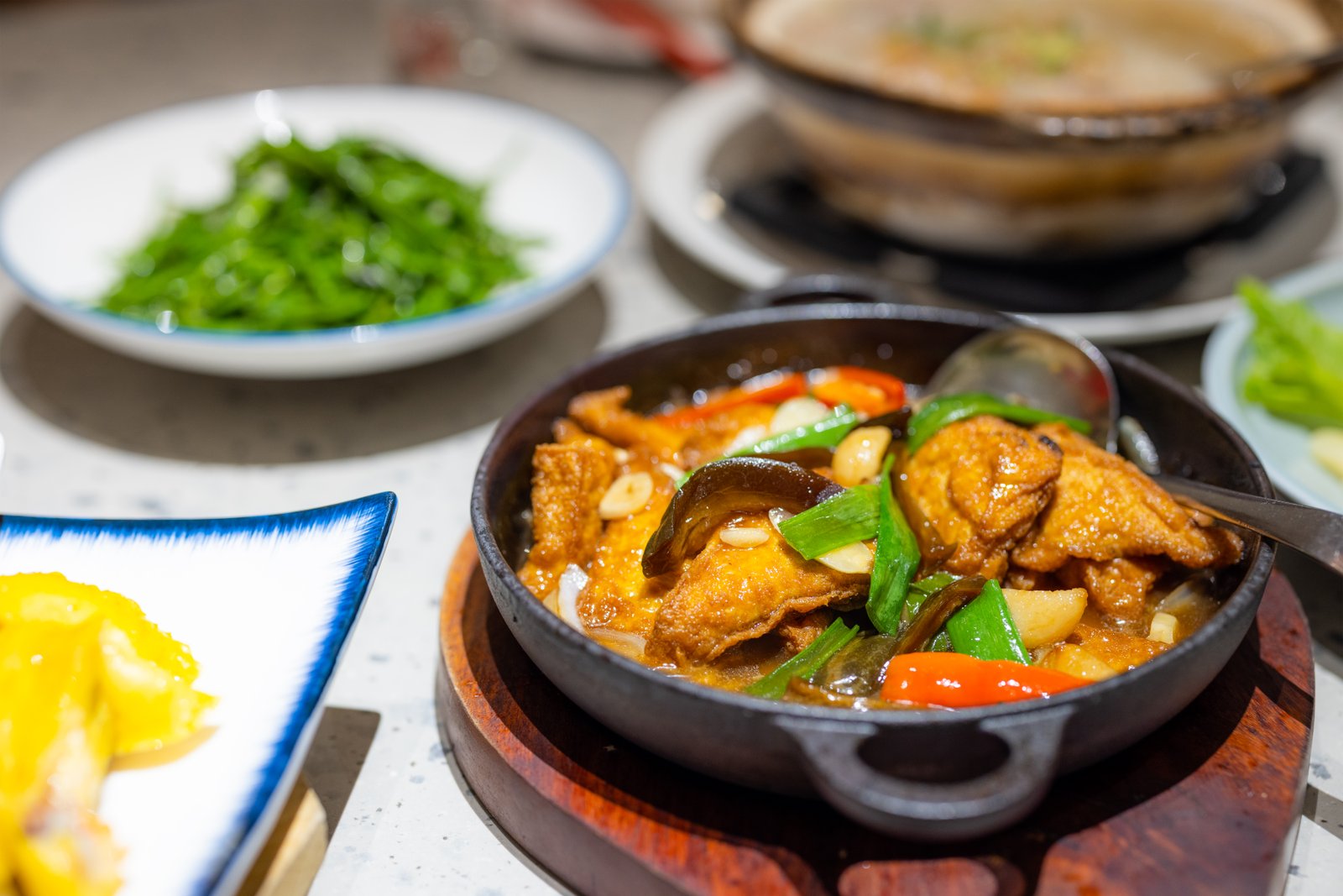 A variety of authentic Chinese dishes served fresh at a reserved table in NYC.