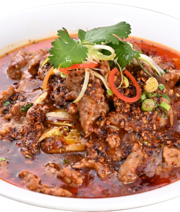 Sichuan spicy beef with chili flakes and cilantro